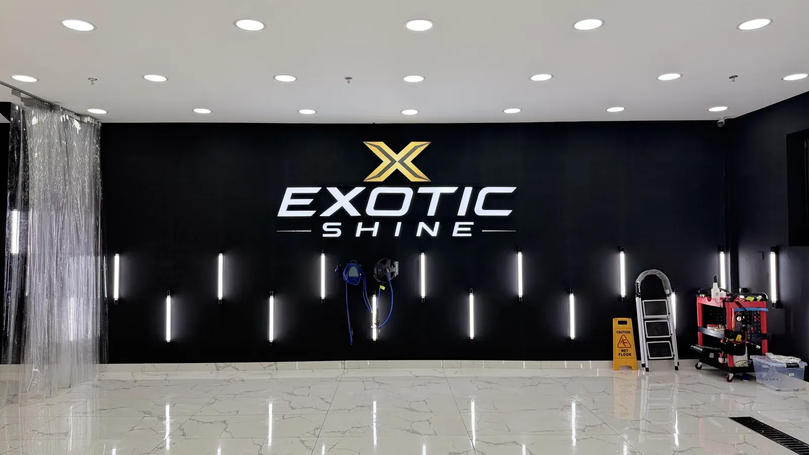 The X Exotic Shine wall with its LED strips and marble floor
