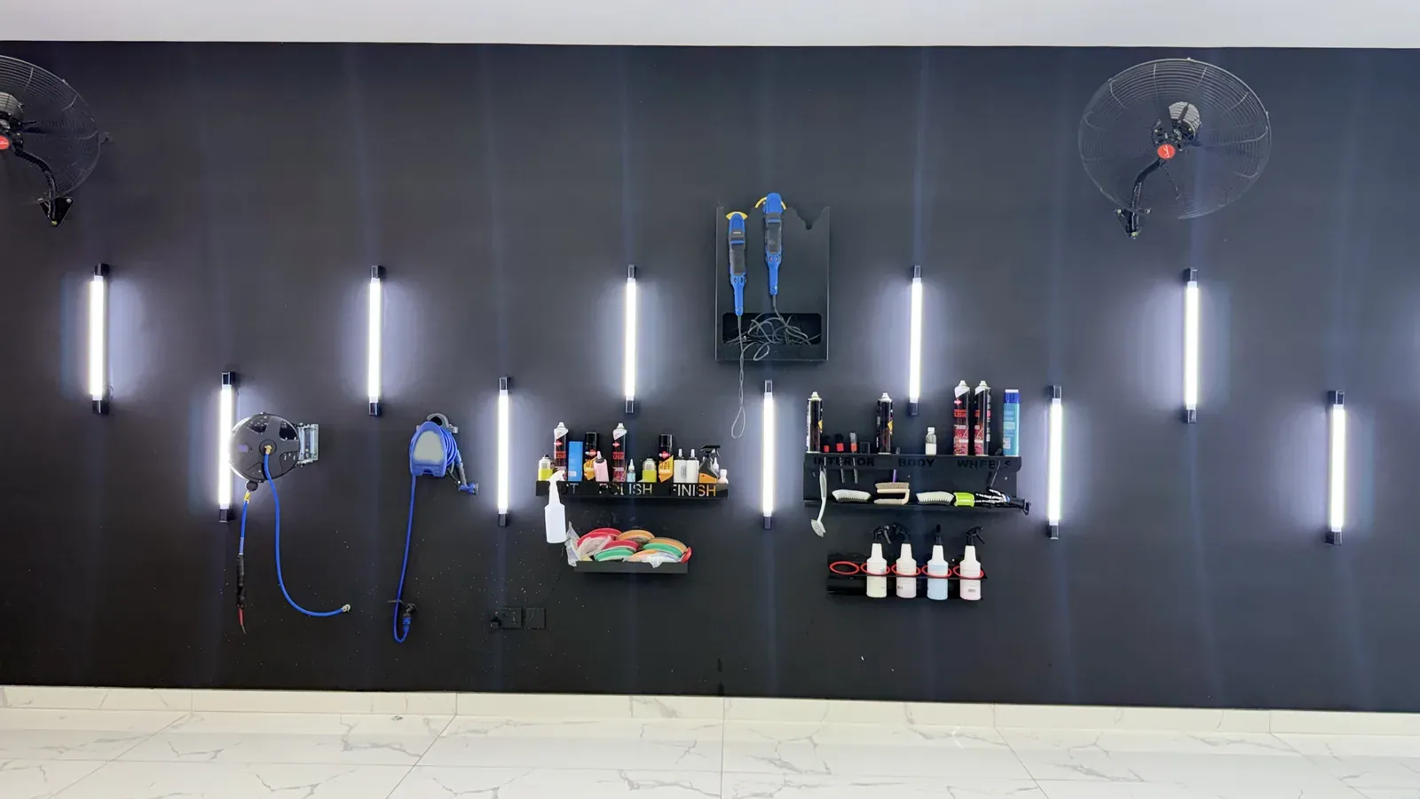 The equipment wall with tools and machine polishers